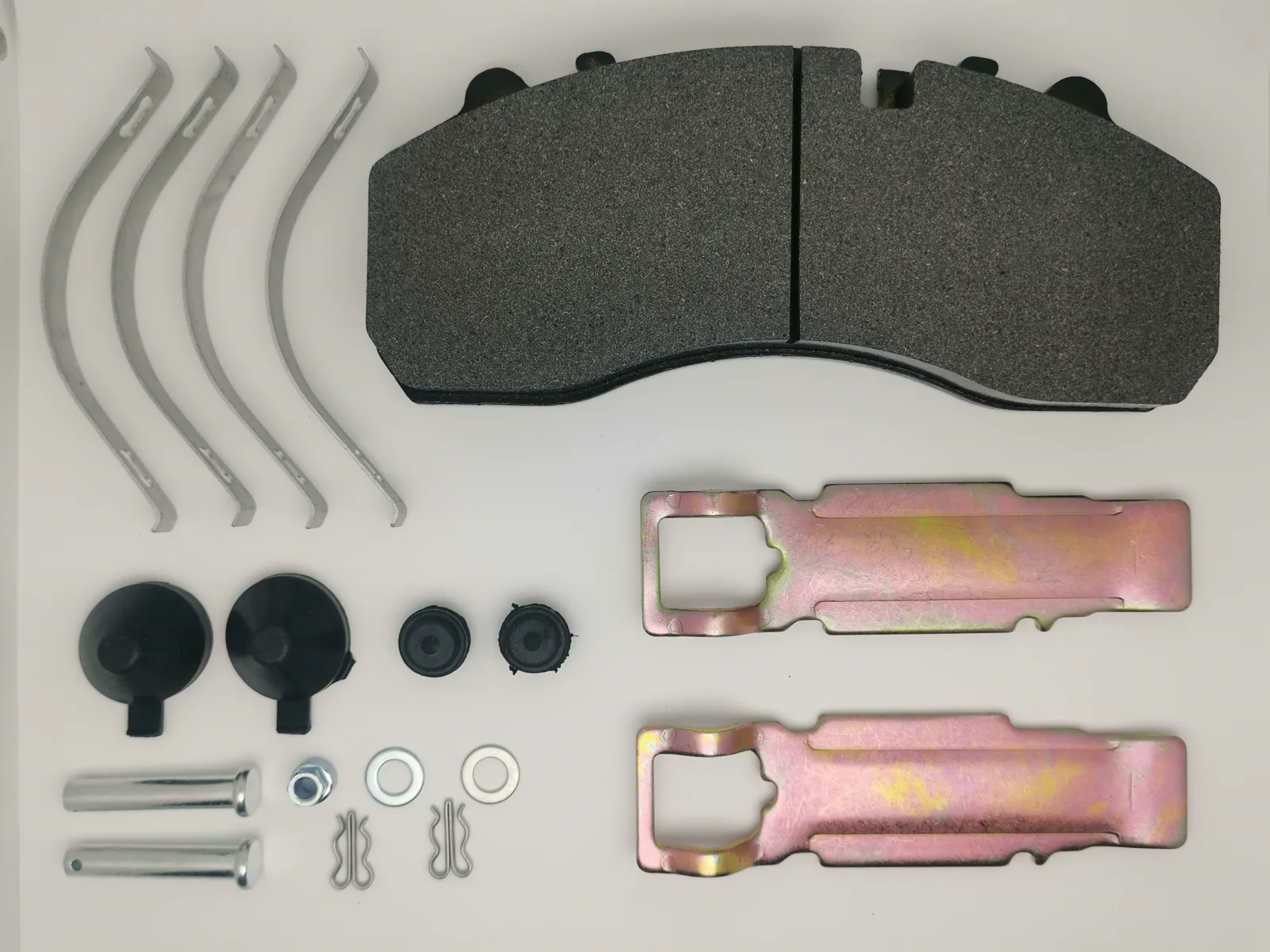 Matched pads, retainers and fitting hardware